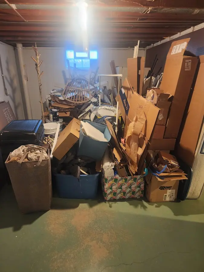 Roll-off dumpster container at job site for 4 Yard Dumpster Rental in Mountain Green